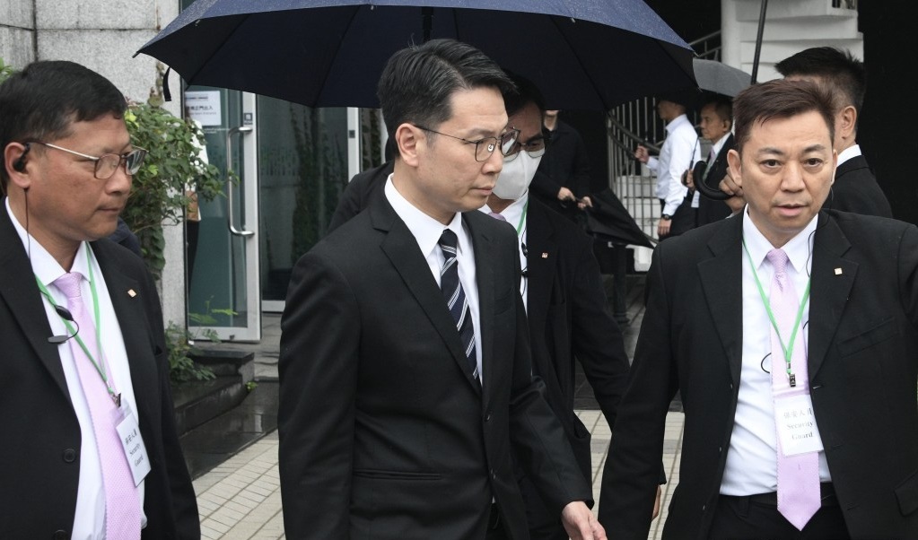 Assistant Director (New Territories North) of the Fire Services Department Tang Wing-wah (middle) offered his statement at the Wang Fuk Court fire hearing on Friday.