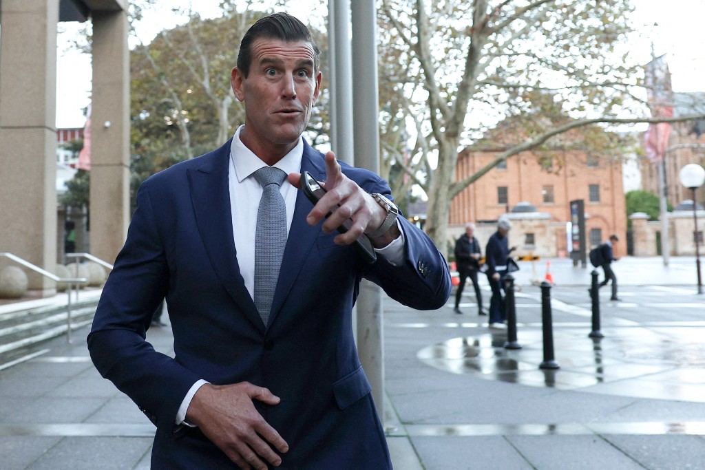 Photo by SAEED KHAN / AFP  / (FILES) A file photo taken on May 1, 2025 shows former member of Australia's elite Special Air Service regiment Ben Roberts-Smith leaving the Federal Court in Sydney.