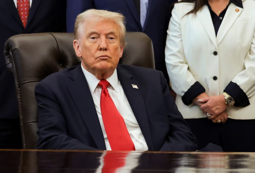 U.S. President Donald Trump looks on during an event to make announcements on fertility treatment coverage, in the Oval Office at the White House in Washington, D.C., U.S., October 16, 2025. REUTERS