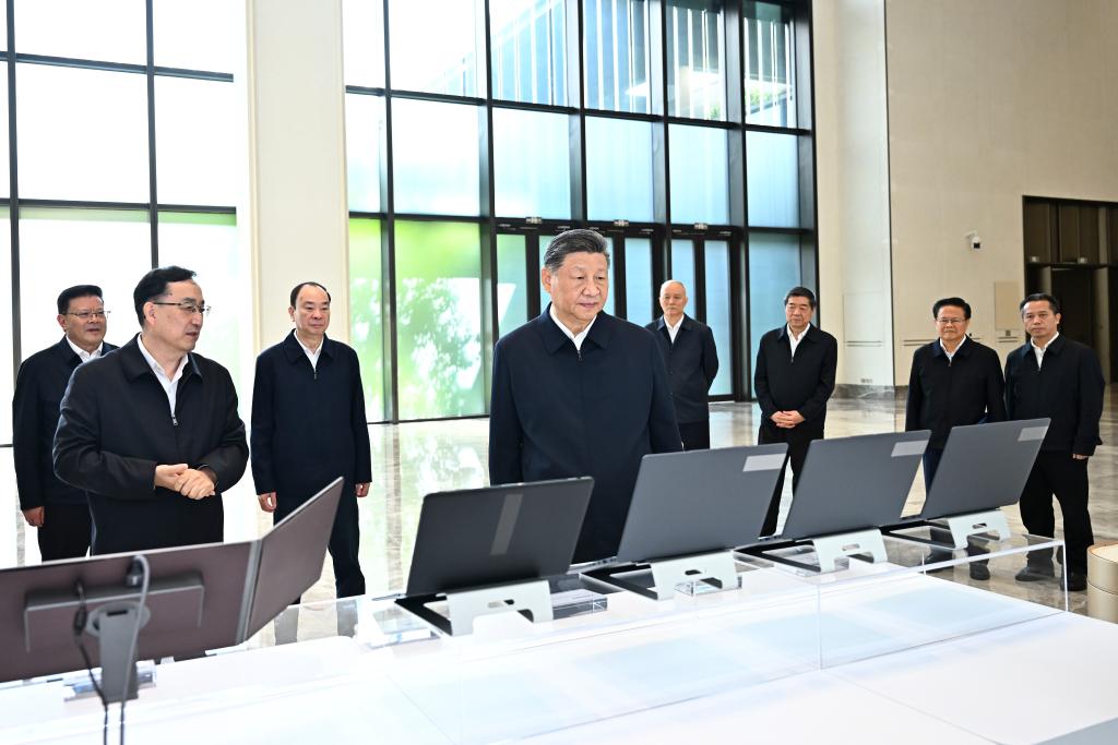 Chinese President Xi Jinping, also general secretary of the Communist Party of China Central Committee and chairman of the Central Military Commission, inspects the exhibition of Guangdong's achievements in the integrated development of technological and industrial innovation in Guangzhou, south China's Guangdong Province, Nov. 8, 2025. Xi made an inspection tour in south China's Guangdong Province on Friday and Saturday. (Xinhua/Yan Yan)