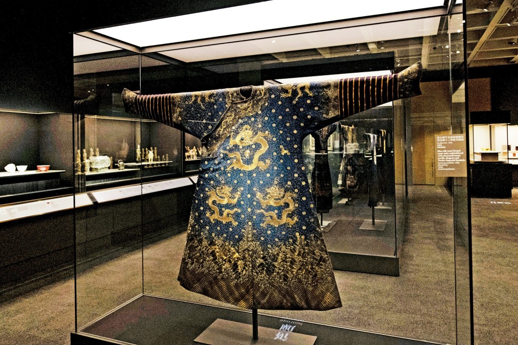 Blue silk semi-formal court robe embroidered with chrysanthemum scrolls, dragons and Twelve Imperial Symbols. SING TAO