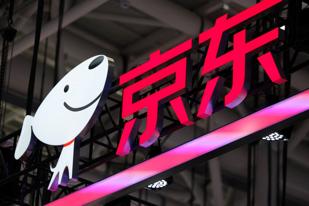 A logo of Chinese e-commerce giant JD.com is displayed at the company? booth at the 2026 World Robot Conference, in Beijing, China, August 20, 2026. REUTERS/Maxim Shemetov