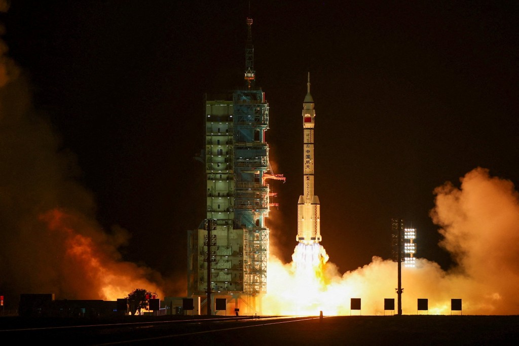 A Long March 2F rocket carrying the Shenzhou-23 spacecraft with astronauts Zhu Yangzhu, Zhang Zhiyuan, and Lai Ka-ying, who is the first astronaut from Hong Kong, blasts off to China's Tiangong space station from the launchpad at the Jiuquan Satellite Launch Center, near Jiuquan, Gansu province, China, May 24, 2026. (Reuters)