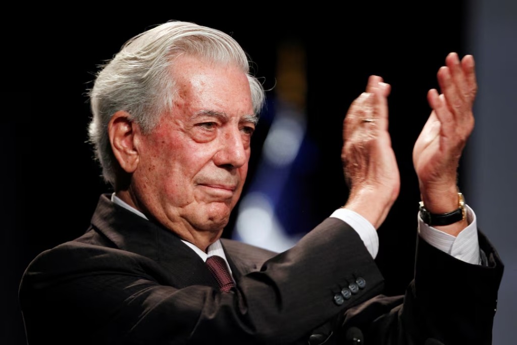 Mario Vargas Llosa, winner of the 2010 Nobel Prize for Literature, applauds during the opening ceremony of the international seminar "Latin America: Opportunities and Challenges" in Lima, March 20, 2012. (Reuters)