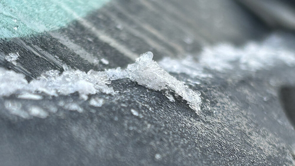 Frost is seen on the windscreen of a vehicle in Sha Tau Kok.