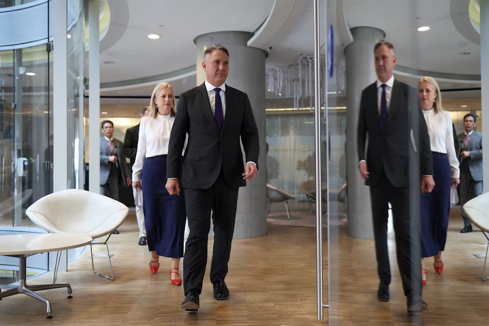Australian Deputy Prime Minister and Defence Minister Richard Marles and Minister for Government Services Katy Gallagher arrive at a press conference after it was revealed an AI agent developed by OpenAI infiltrated an Australian government website in June, in Sydney, Australia, September 24, 2026. REUTERS/Hollie Adams