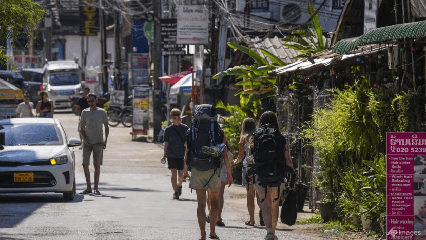 Backpacking foreign tourists roam around in Vang Vieng, Laos, Nov 22, 2024. (Photo: AP/Anupam Nath) Backpacking foreign tourists roam around in Vang Vieng, Laos, Nov 22, 2024. (Photo: AP/Anupam Nath)
