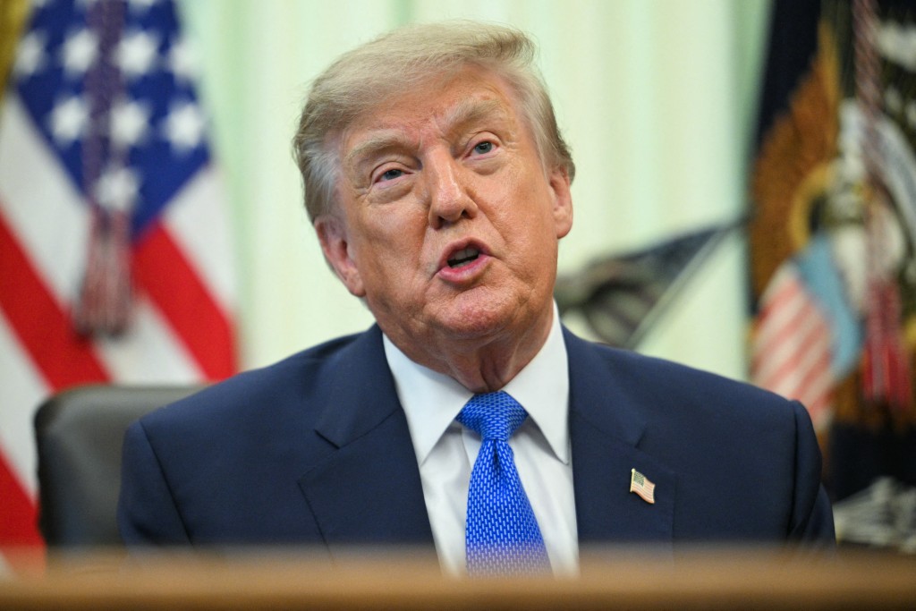 Photo by JIM WATSON / AFP  US President Donald Trump speaks before signing an executive order calling for more research and flexibility on vaccines, in the Oval Office of the White House in Washington, DC, on August 10, 2026.