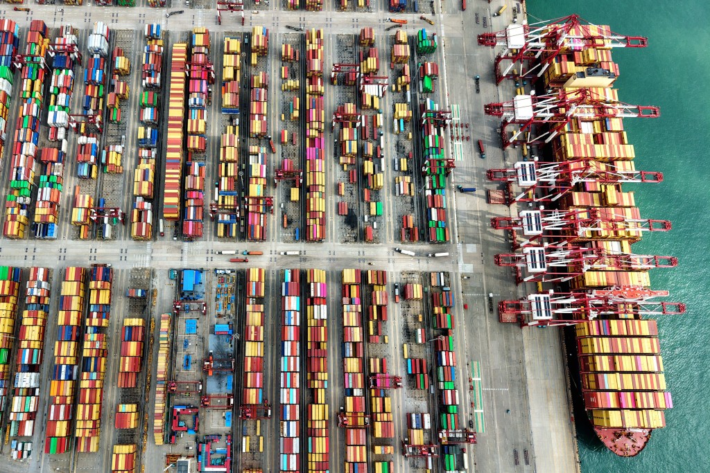 A ship is seen at the container terminal of the port in Qingdao, in China’s eastern Shandong province on October 9, 2025. (AFP)