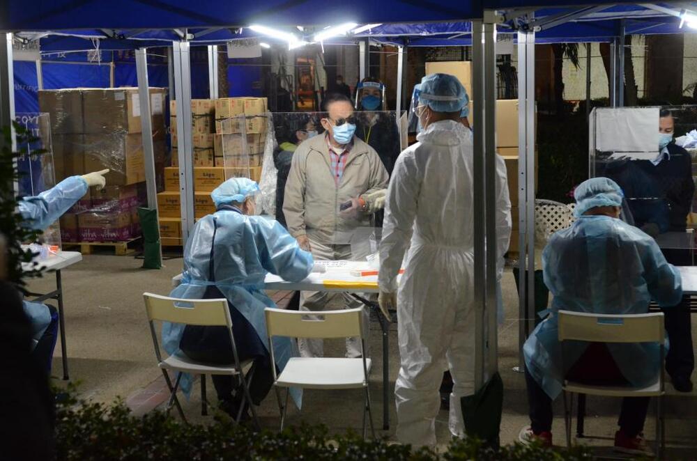 Residents undergo compulsory Covid-19 testing. 