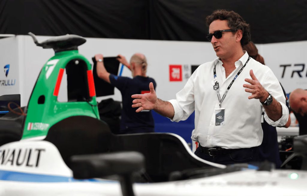 Alejandro Agag, Formula E CEO, gestures next to Michela Cerruti's Formula E car in the box during an interview with Reuters ahead of round four of the Formula E championship in Buenos Aires, January 8, 2015. REUTERS/Marcos Brindicci/ File Photo