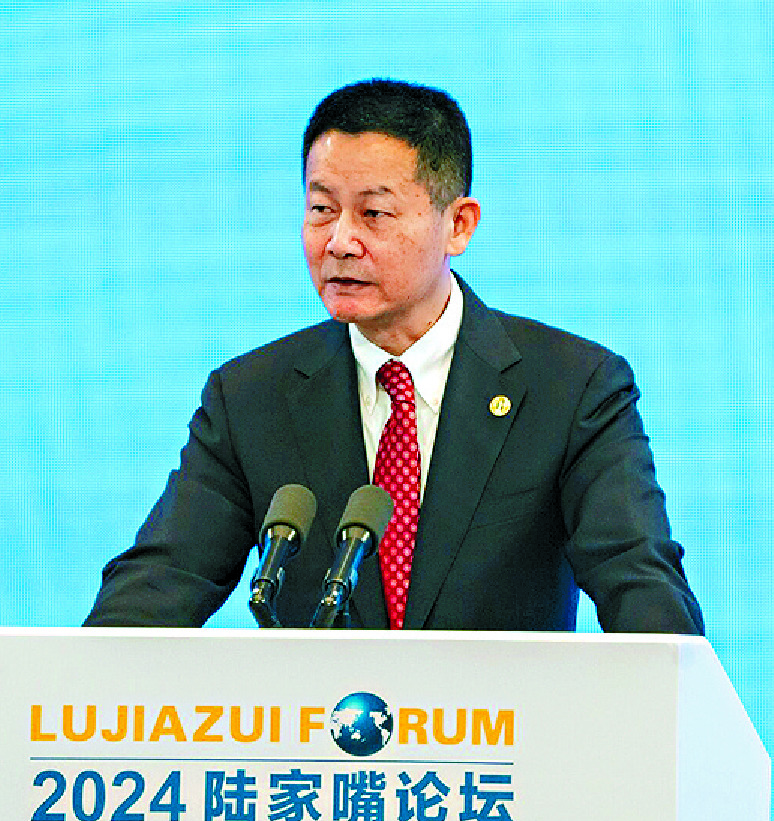 From left: Pan Gongsheng, Wu Qing and Li Yunze speak at the conference. BLOOMBERG From left: Pan Gongsheng, Wu Qing and Li Yunze speak at the conference. BLOOMBERG