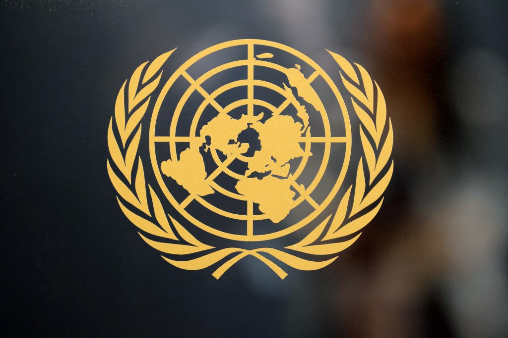 The United Nations logo is pictured at UN headquarters ahead of the United Nations General Assembly (UNGA) in New York on September 22, 2025. (Photo by Ludovic MARIN / AFP)