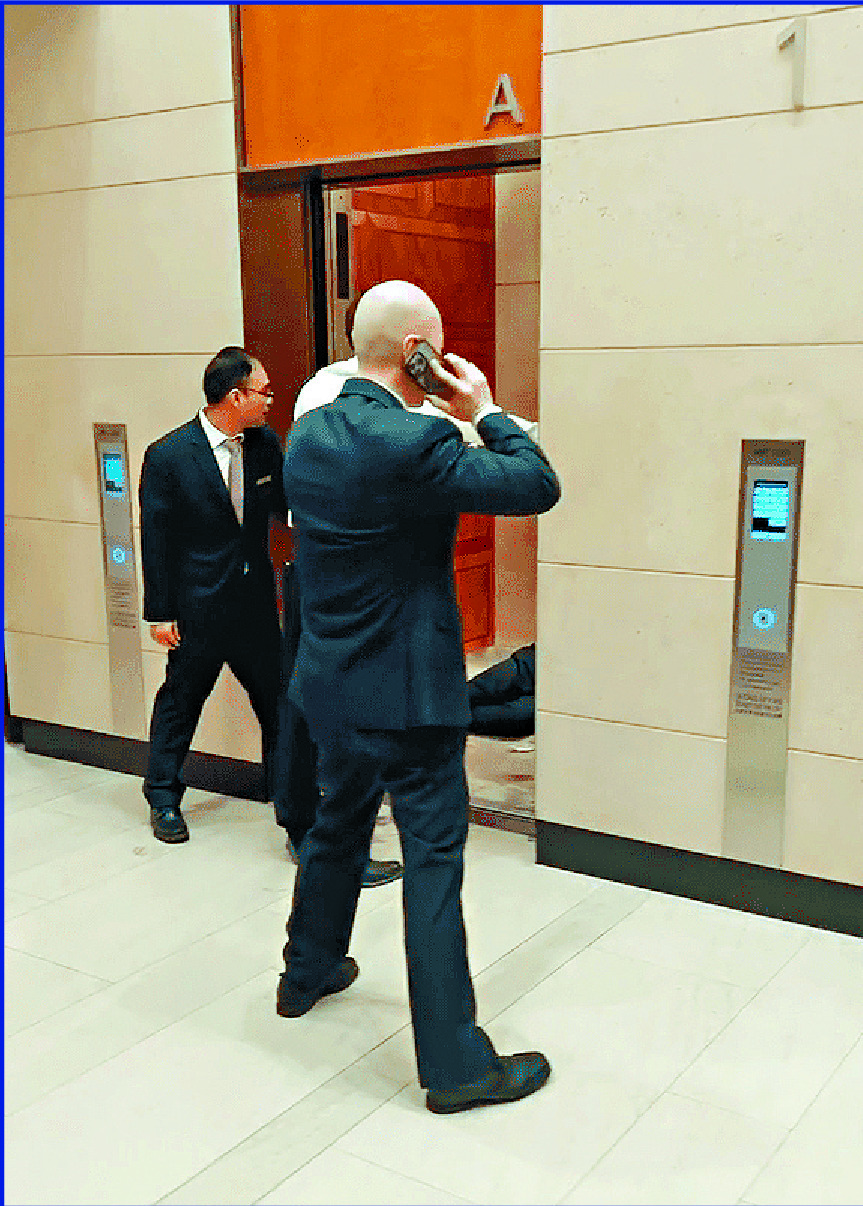 Witnesses reported that the man took out a can of naptha and a can of thinner from his suitcase and poured the contents onto himself inside the elevator. Witnesses reported that the man took out a can of naptha and a can of thinner from his suitcase and poured the contents onto himself inside the elevator.