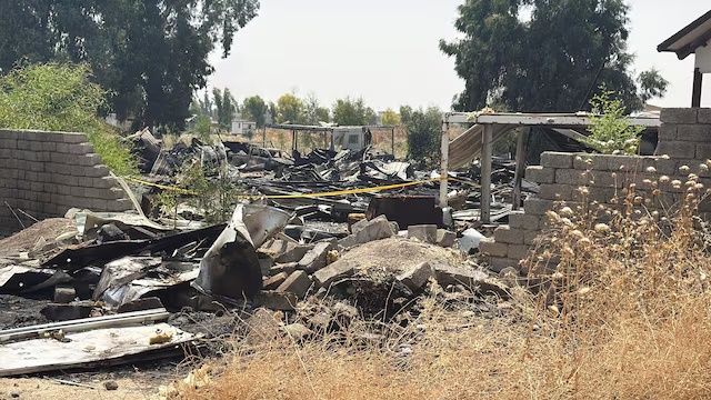 Damage at a site belonging to Iraq's Popular Mobilization Forces (PMF) following airstrikes that the PMF said were carried out by U.S. and Saudi forces, in Bartella, Nineveh province, Iraq, July 29, 2026. Picture taken with a mobile phone. REUTERS/Khalid Al-Mousily