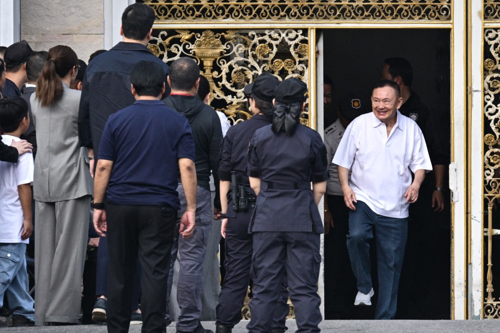 Thailand's former prime minister Thaksin Shinawatra (R) is greeted by his family members and relatives upon his release at Klong Prem Central Prison in Bangkok on May 11, 2026. (AFP)