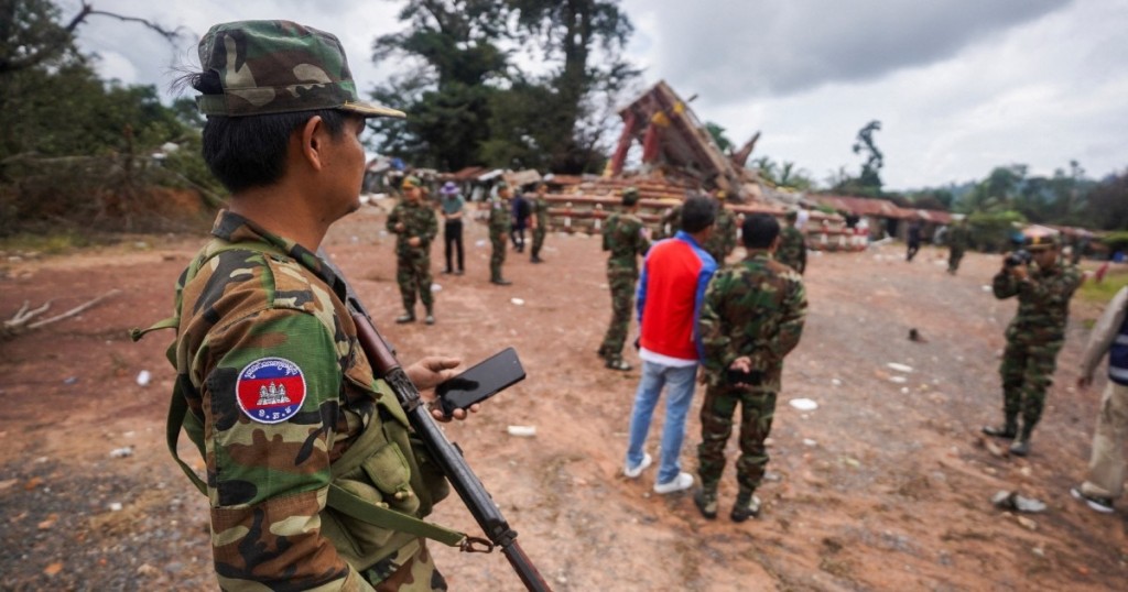 A military personnel takes position at the closed An Ses border checkpoint, also known as Chong Arn Ma in Thai, during an inspection by foreign military attaches from major powers and Asean member countries. Reuters