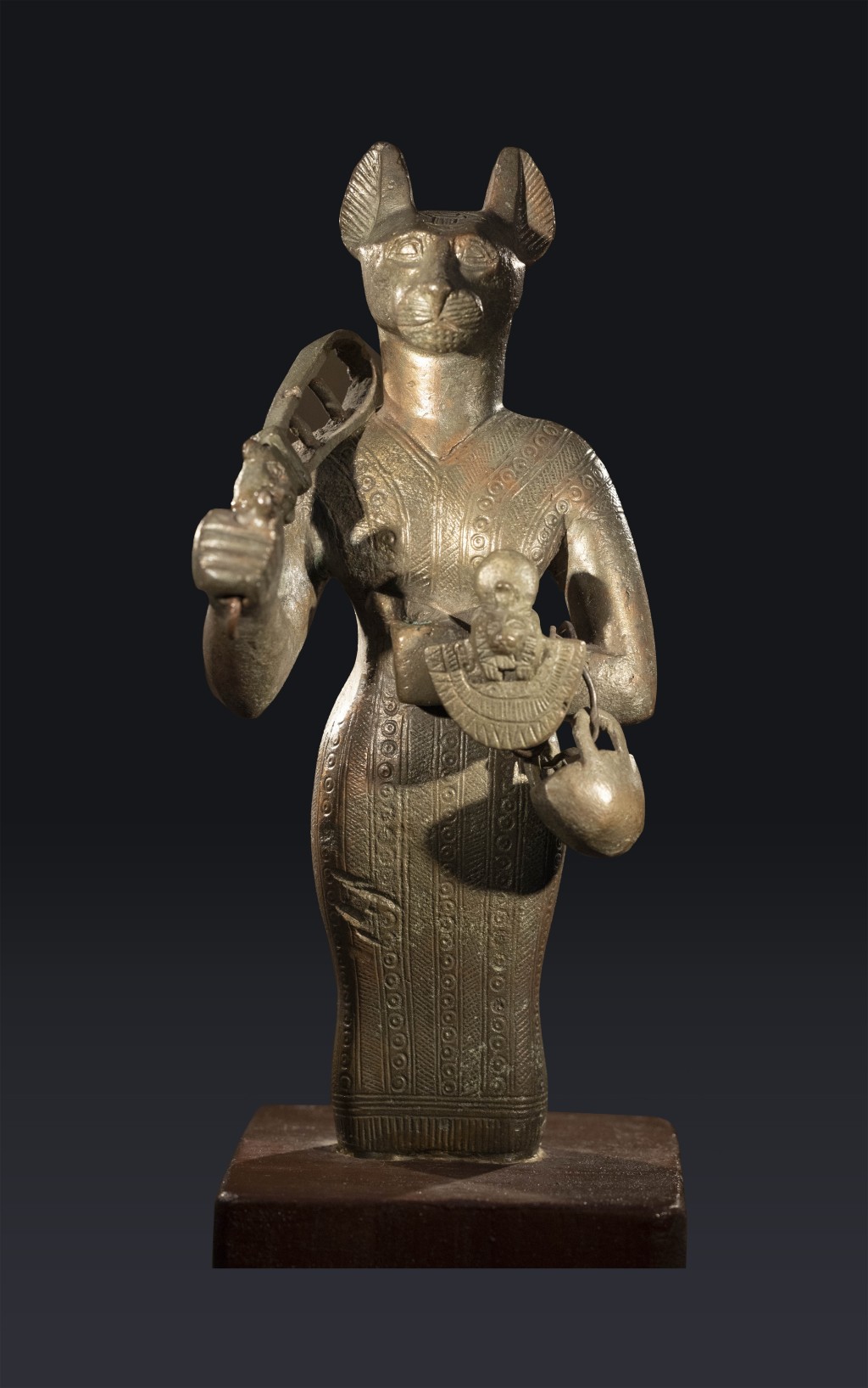 Statue of Bastet holding a sistrum