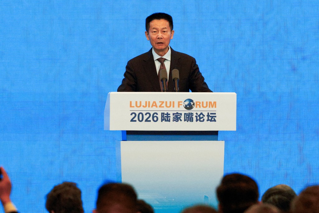 Wu Qing, chairman of the China Securities Regulatory Commission, speaks at the Lujiazui Forum 2026 in Shanghai, China June 17, 2026. REUTERS/Xihao Jiang