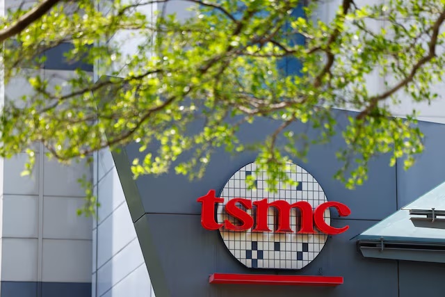 The TSMC logo is displayed on a building in Hsinchu, Taiwan April 15, 2025. REUTERS/Ann Wang