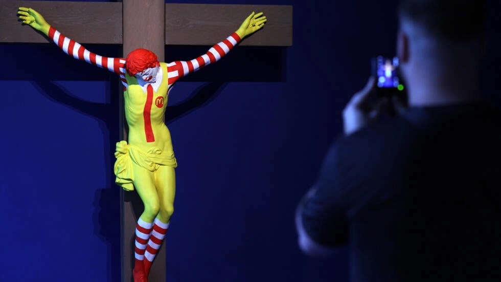 A visitor looks at 'McJesus' by Finnish artist Jani Leinonen at a new Barcelona museum dedicated to art that has been censored © LLUIS GENE / AFP A visitor looks at 'McJesus' by Finnish artist Jani Leinonen at a new Barcelona museum dedicated to art that has been censored © LLUIS GENE / AFP