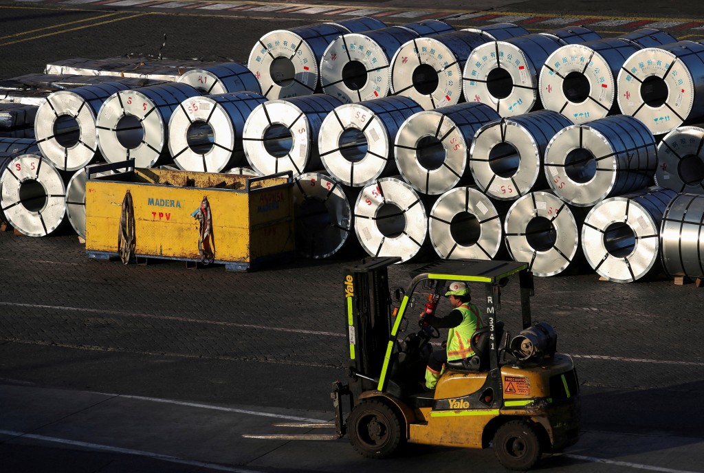 FILE PHOTO: Steel rolls from China are seen after being unloaded at the Valparaiso port, Chile July 10, 2025. REUTERS/Rodrigo Garrido/File Photo