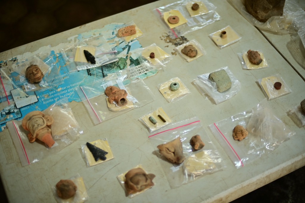 Photo by MARCO ANTONIO MARTINEZ / AFP  View of various objects—possibly in the Maya style—found at an archaeological site, which have been cataloged and are undergoing classification and documentation in Coatepec, Veracruz, Mexico on June 18, 2026.