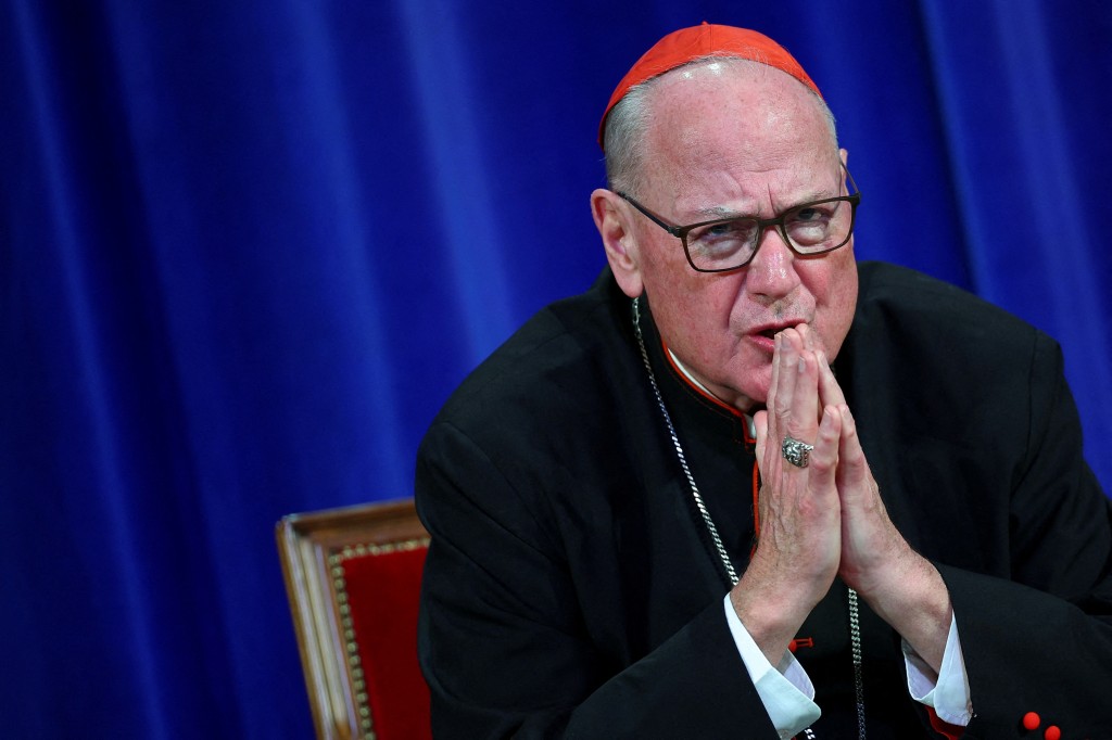 FILE PHOTO: Cardinal Timothy Dolan attends a press conference following the election of Pope Leo XIV, at the Pontifical North American College in Rome, Italy, May 9, 2025. REUTERS/Guglielmo Mangiapane/File Photo
