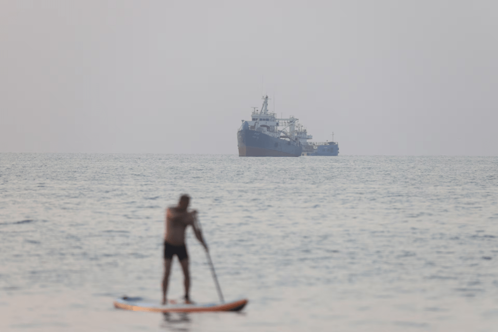 Vessels in the Strait of Hormuz near the beach of Bandar Abbas, Iran, June 21, 2026. Amirhosein Khorgooi/ISNA/via WANA (West Asia News Agency)via REUTERS
