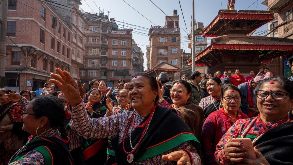 Women in traditional attire dance as a 16th century statue of Hindu deity Uma-Maheswora, that was stolen four decades ago and later repatriated is paraded before reinstating the same at the premises of a temple where it belonged in Lalitpur, Nepal, Thursday, Feb. 15, 2024. The idol had somehow ended up at the Brooklyn Museum in New York, which handed over the same to the Manhattan District Attorney's Office paving way to its return to Nepal. (AP Photo/Niranjan Shrestha) Women in traditional attire dance as a 16th century statue of Hindu deity Uma-Maheswora, that was stolen four decades ago and later repatriated is paraded before reinstating the same at the premises of a temple where it belonged in Lalitpur, Nepal, Thursday, Feb. 15, 2024. The idol had somehow ended up at the Brooklyn Museum in New York, which handed over the same to the Manhattan District Attorney's Office paving way to its return to Nepal. (AP Photo/Niranjan Shrestha)