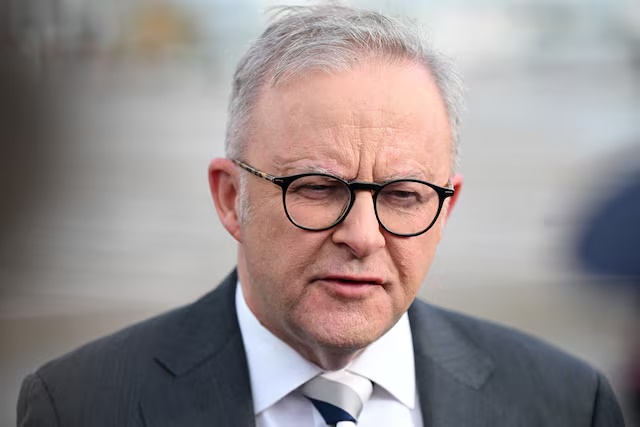 Australian Prime Minister Anthony Albanese speaks to media after arriving at Shanghai Pudong International Airport in Shanghai, China, July 12, 2025. Albanese has travelled to China for a six-day visit. AAP/Lukas Coch via REUTERS