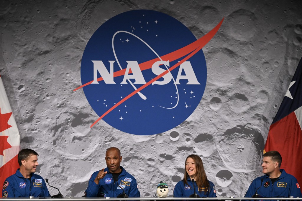 Photo by RONALDO SCHEMIDT / AFP  R) NASA's Artemis II mission astronauts, commander Reid Wiseman, Victor Glover, Christina Koch and Canadian Space Agency's Jeremy Hansen speak during a press conference at Johnson Space Center in Houston, Texas, on April 16, 2026.