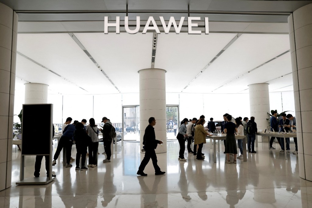 Customers shop at Huawei's flagship store in Beijing, China. Reuters