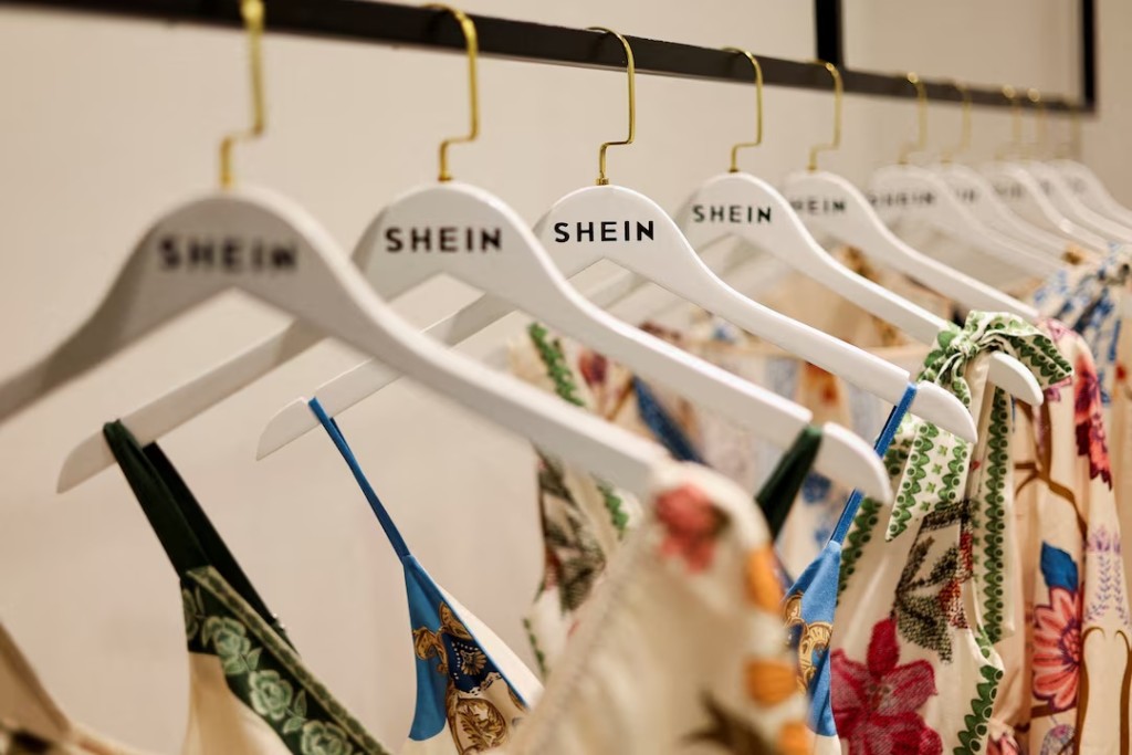 Clothes from fast-fashion brand Shein hang at their office in Sao Paulo, Brazil, December 15, 2025. REUTERS/Jorge Silva/File Photo