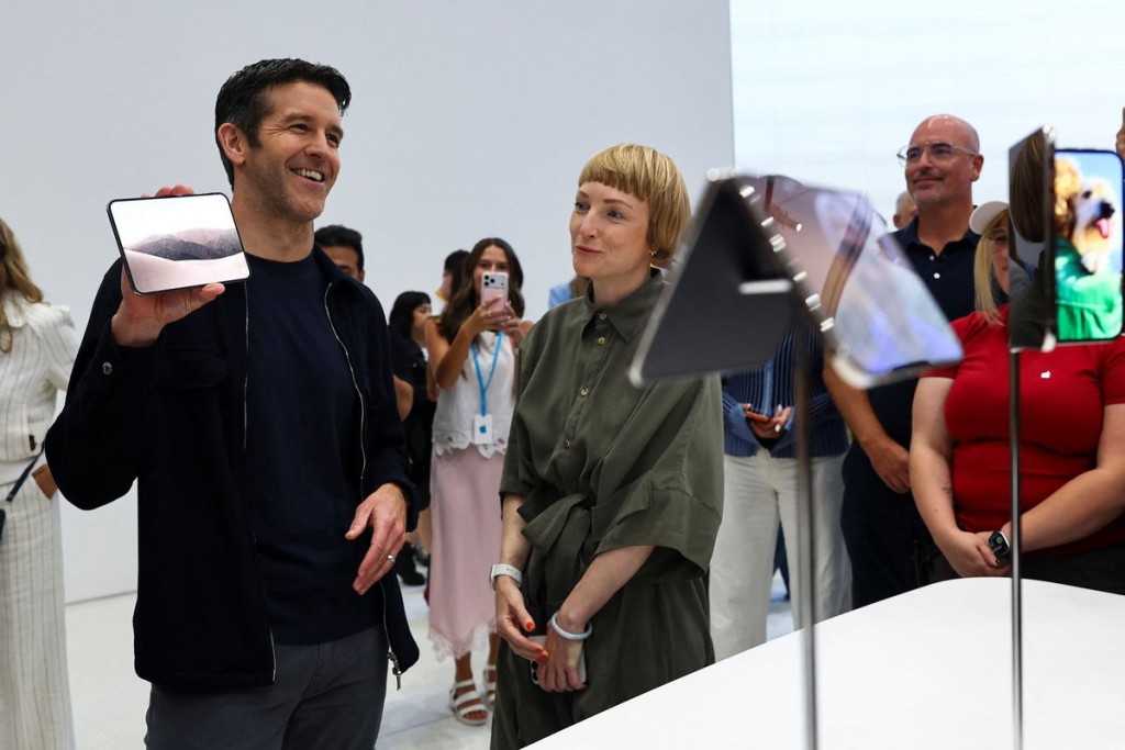 New Apple CEO John Ternus holds the new foldable iPhone Duo during Apple's event at the Steve Jobs Theater in Cupertino, California. Reuters