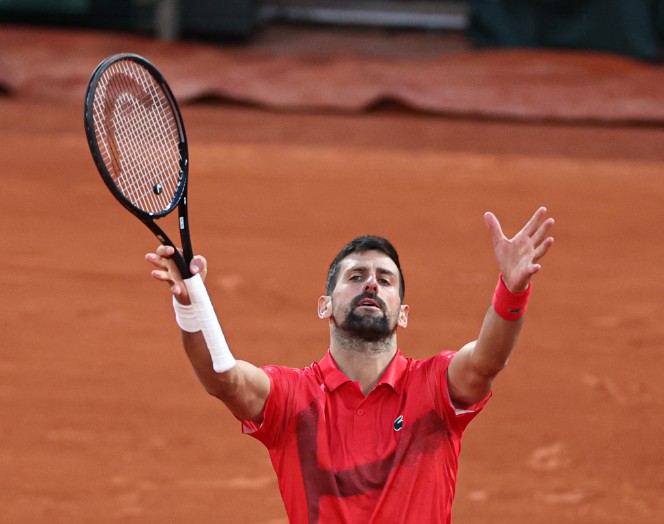 Novak Djokovic reacts during his semi-final against Jannik Sinner at the French Open. (Xinhua)