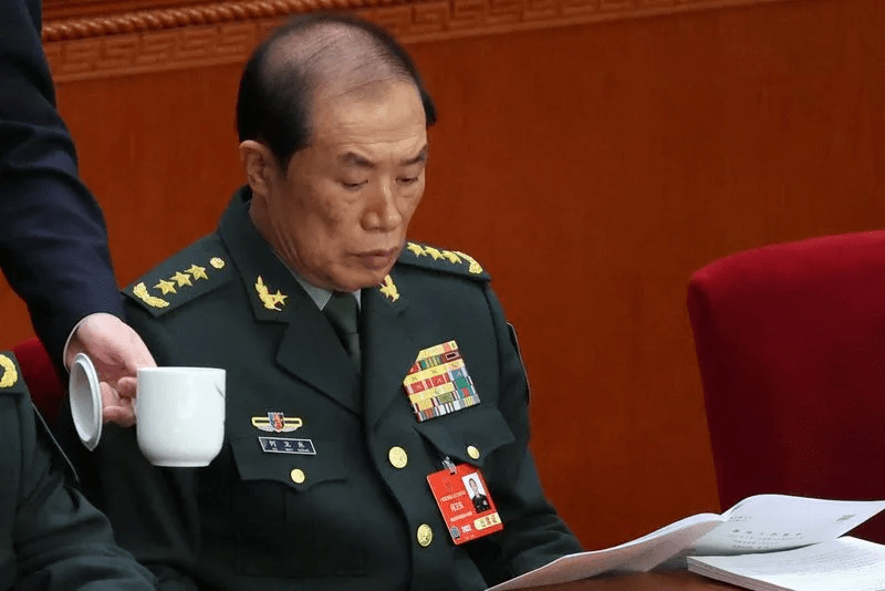 Central Military Commission Vice Chairman He Weidong attends the opening session of the National People's Congress (NPC) at the Great Hall of the People in Beijing, China March 5, 2025. REUTERS/Florence Lo