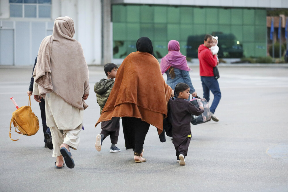 (AP photo) US-affiliated Afghans arriving at a US airport (AP photo) US-affiliated Afghans arriving at a US airport