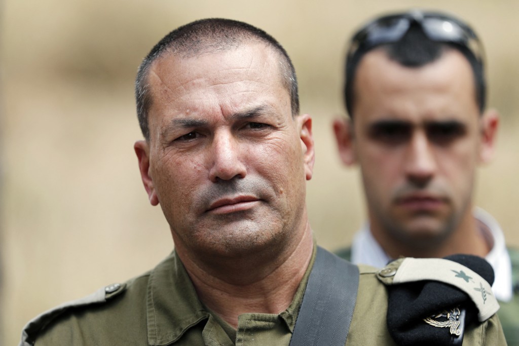 Israeli army major general Eyal Zamir looks on as he stands near the Israel-Gaza border in the southern kibbutz of Nahal Oz on April 20, 2018. The Israeli military said in a statement issuded on August 13, 2025 that Zamir, the armed forces chief lieutenant general, had approved the "framework" for a new offensive in the Gaza Strip, days after the security cabinet called for the seizure of Gaza City. (Photo by THOMAS COEX / AFP)