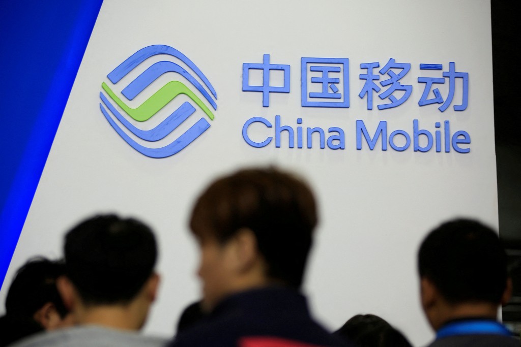 A sign of China Mobile is seen at CES (Consumer Electronics Show) Asia 2016 in Shanghai, China, May 12, 2016. To match Special Report US-CHINA-TECH/CABLES REUTERS