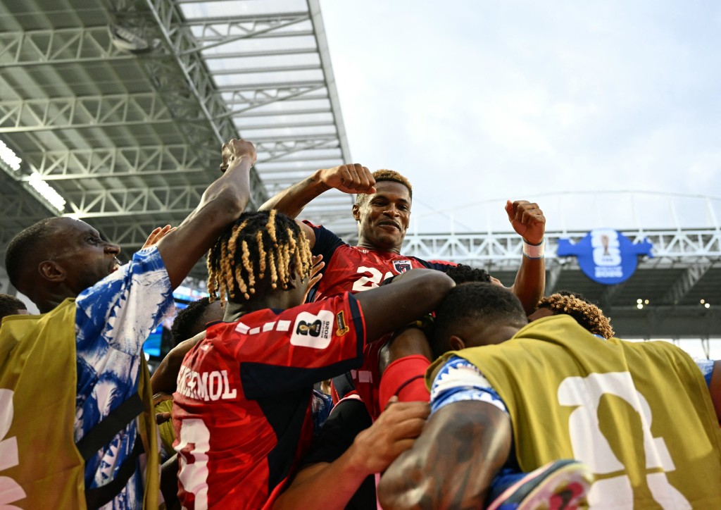 Cape Verde's forward #26 Helio Varela celebrates with teammates after scoring his team's second goal during the 2026 World Cup Group H football match between Uruguay and Cape Verde (AFP)