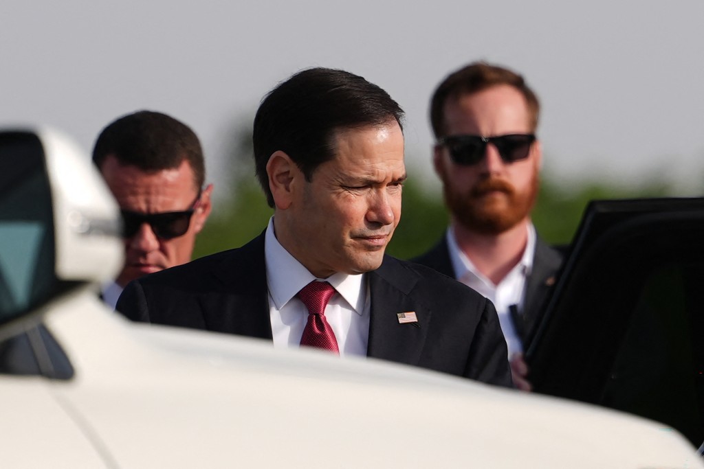 US Secretary of State Marco Rubio prepares to board his plane at Jaipur International Airport in Jaipur on May 26, 2026. (Photo by Julia Demaree Nikhinson / POOL / AFP)