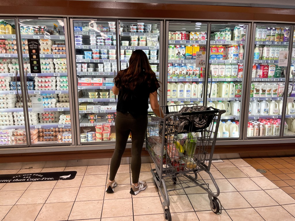 A woman shops in a supermarket as rising inflation affects consumer prices in Los Angeles, California, U.S., June 13, 2022. REUTERS