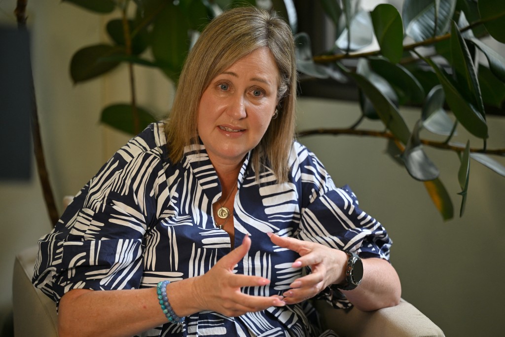 Photo by SAEED KHAN / AFP  This photo taken on November 7, 2025 shows Mia Bannister, mother of the late 14-year-old Ollie Hughes, speaking during an interview in Sydney.