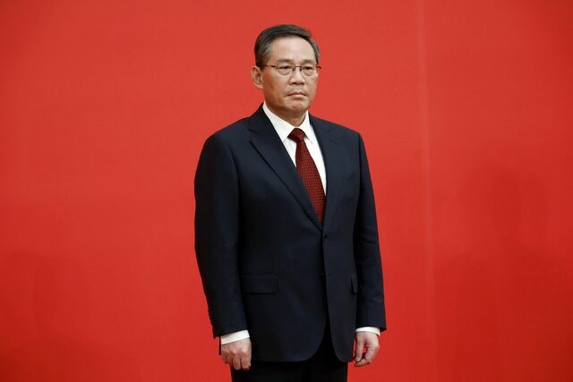 New Politburo Standing Committee member Li Qiang meets the media following the 20th National Congress of the Communist Party of China, at the Great Hall of the People in Beijing, China October 23, 2022. REUTERS/Tingshu Wang