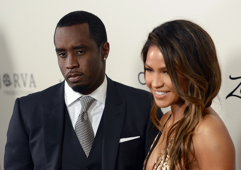 Sean P. Diddy Combs with Cassie Ventura attend the premiere of 'The Perfect Match' at the Arclight Theatre in Los Angeles on March 7, 2016. Sean Combs once had it all: riches, fame and the power to get anything he wanted.  (Photo by Chris Delmas / AFP)