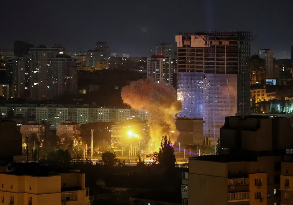 An explosion of a drone is seen in the sky over the city during a Russian drone strike in Kyiv, Ukraine April 24. (Reuters)