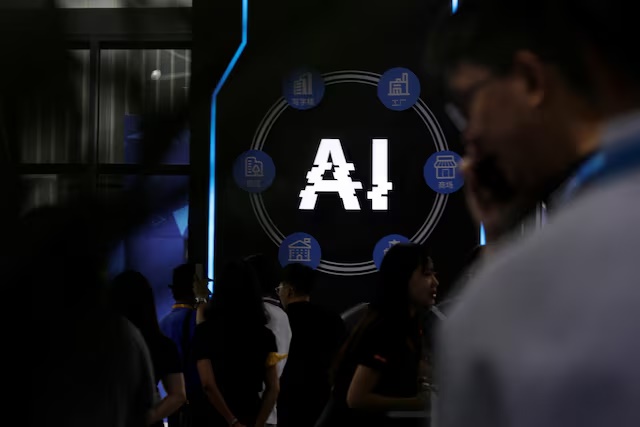 Visitors stand near a sign of artificial intelligence at an AI robot booth at Security China, an exhibition on public safety and security, in Beijing, China June 7, 2023. REUTERS/Florence Lo 