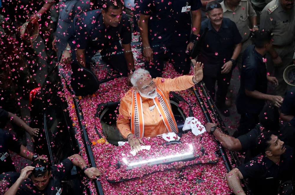 India's Prime Minister Narendra Modi waves to supporters during a roadshow in Varanasi, India, April 25, 2019. Varanasi is Modi’s election constituency. REUTERS/Adnan Abidi/File Photo India's Prime Minister Narendra Modi waves to supporters during a roadshow in Varanasi, India, April 25, 2019. Varanasi is Modi’s election constituency. REUTERS/Adnan Abidi/File Photo