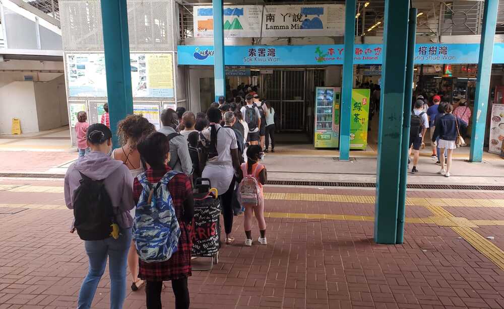 People line up to take ferry to Lamma Island. People line up to take ferry to Lamma Island.